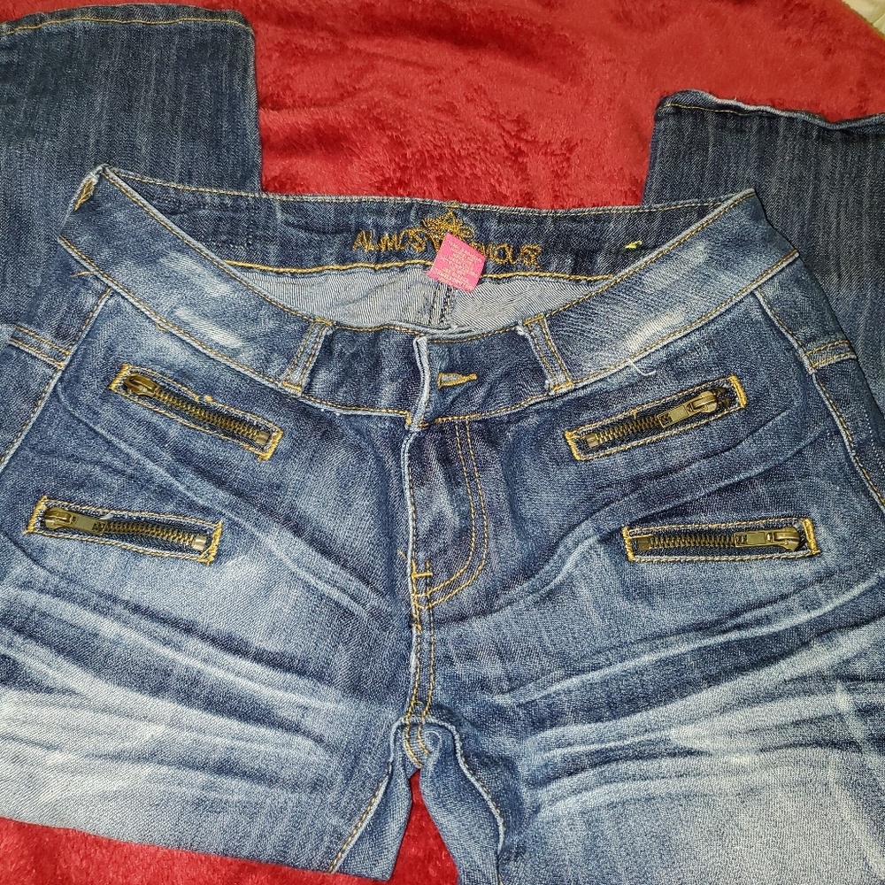 Almost Famous Women's Blue Distressed Cropped Ankle Jeans with Gold Zippers